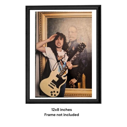 Angus young guitarist - angus, ac/dc